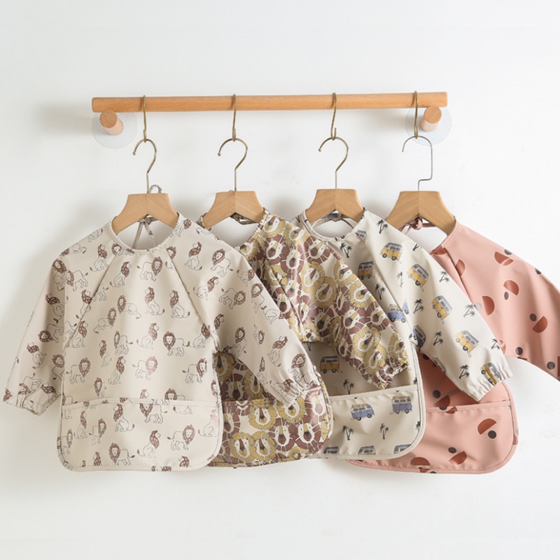 Long-sleeved PU reversible bib - огляд і ціна Bib Long Sleeve